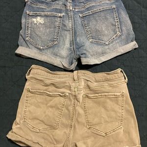 Mid rise juniors size 7 denim jean shorts and olive green shorts. $20 for both.